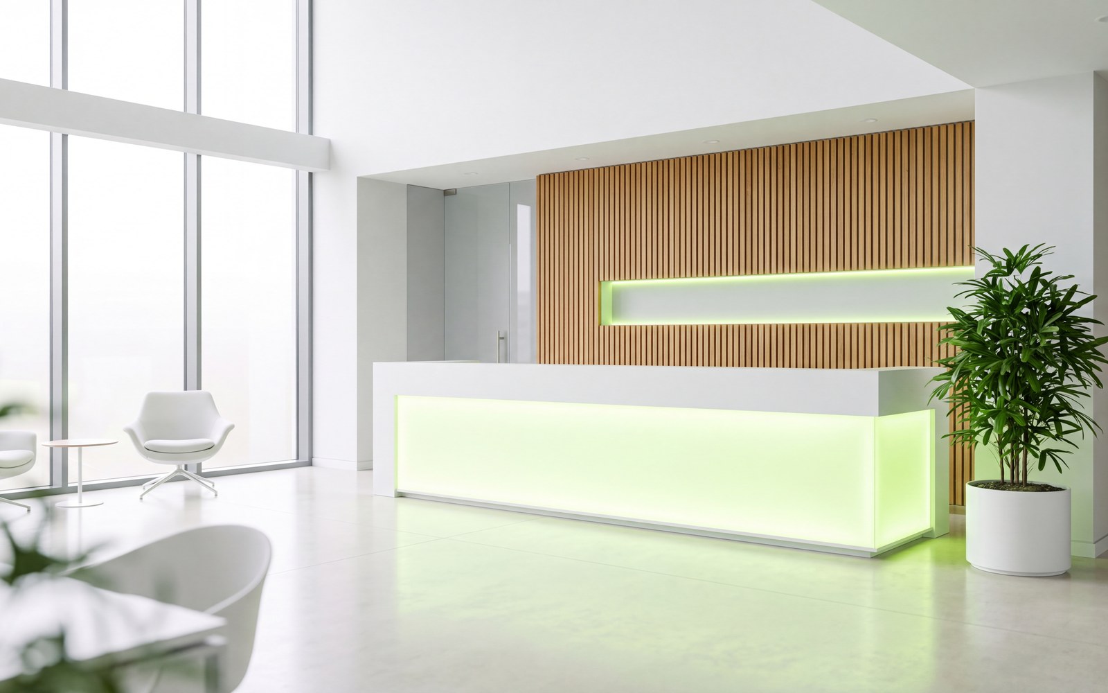 The bright reception of a modern headquarters with a green-lit welcome desk