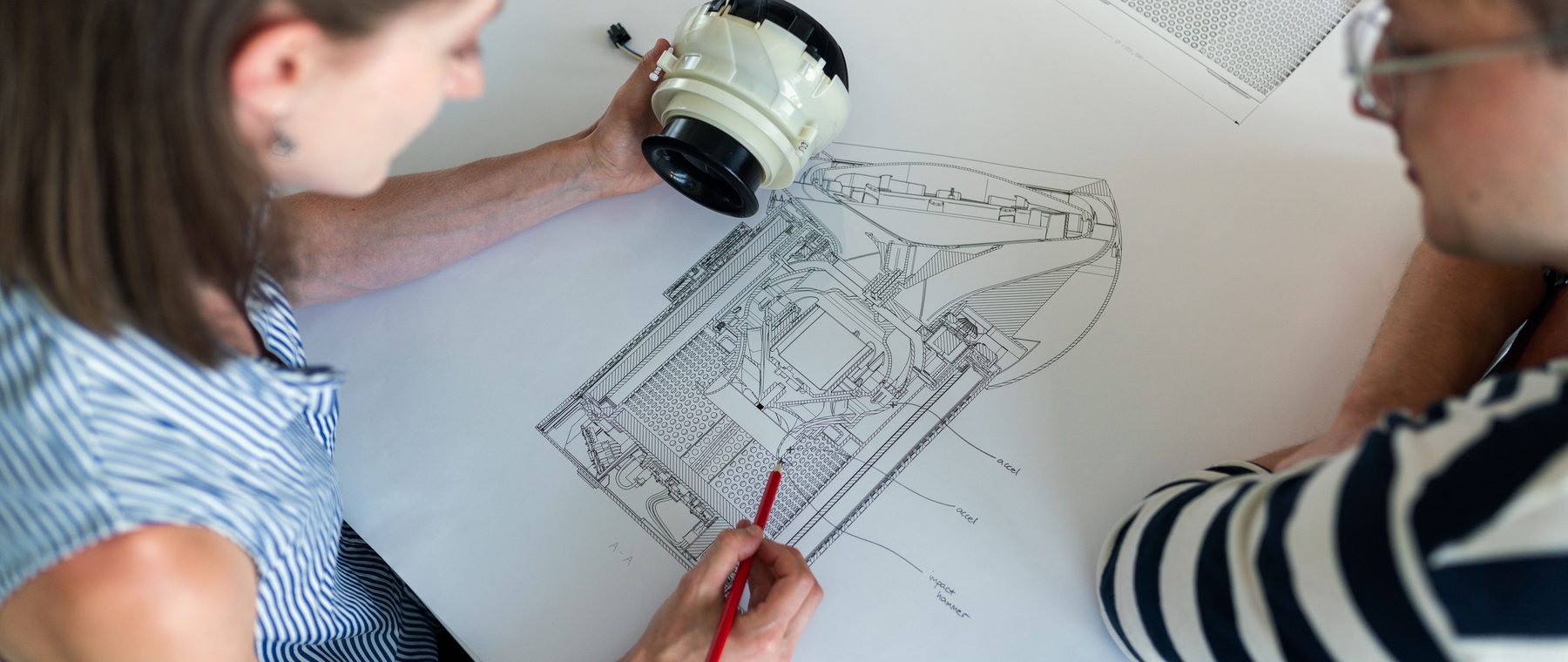 ASME engineers reviewing a detailed design together