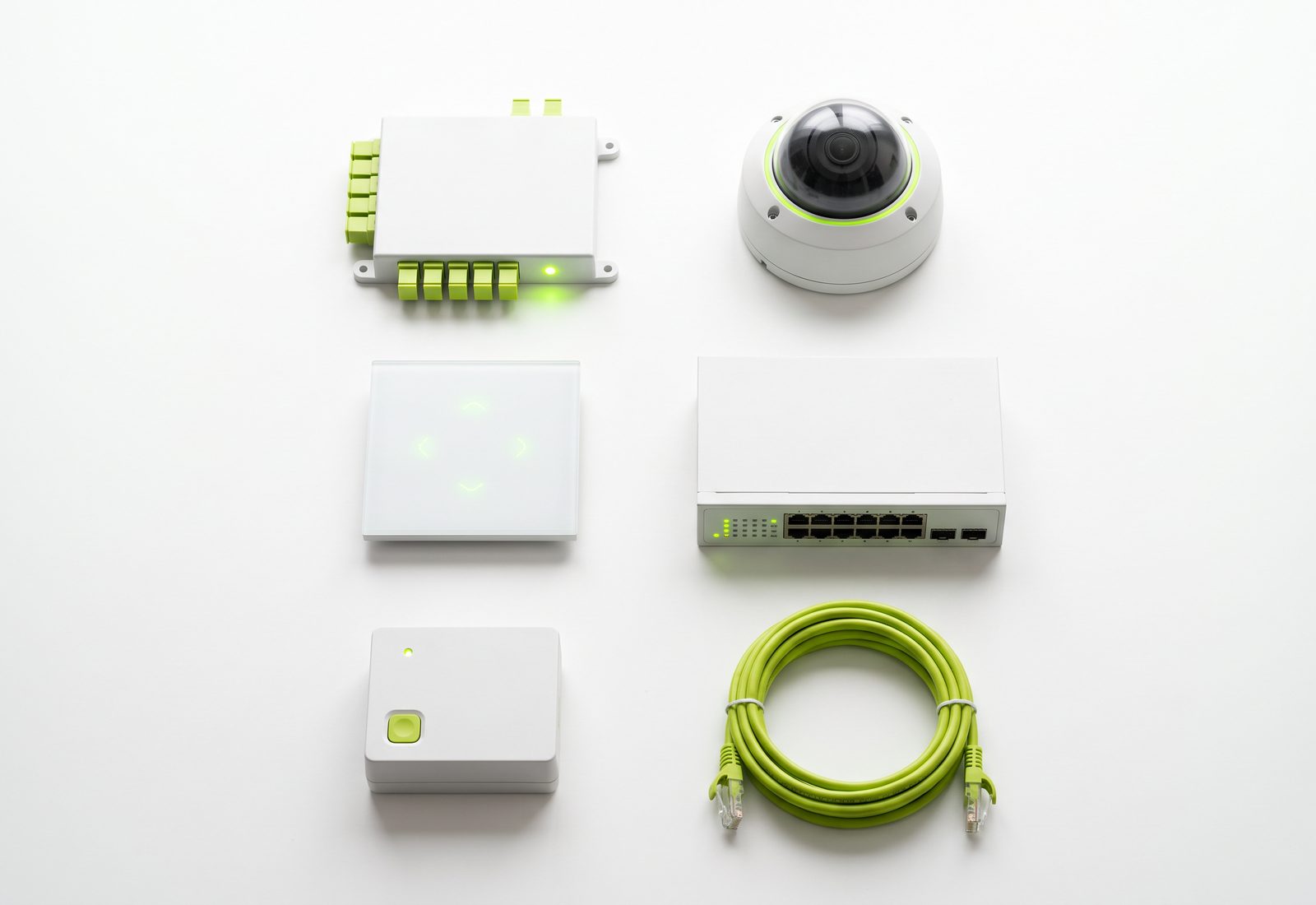 Controllers, a dome camera, a network switch and patch cabling laid out together