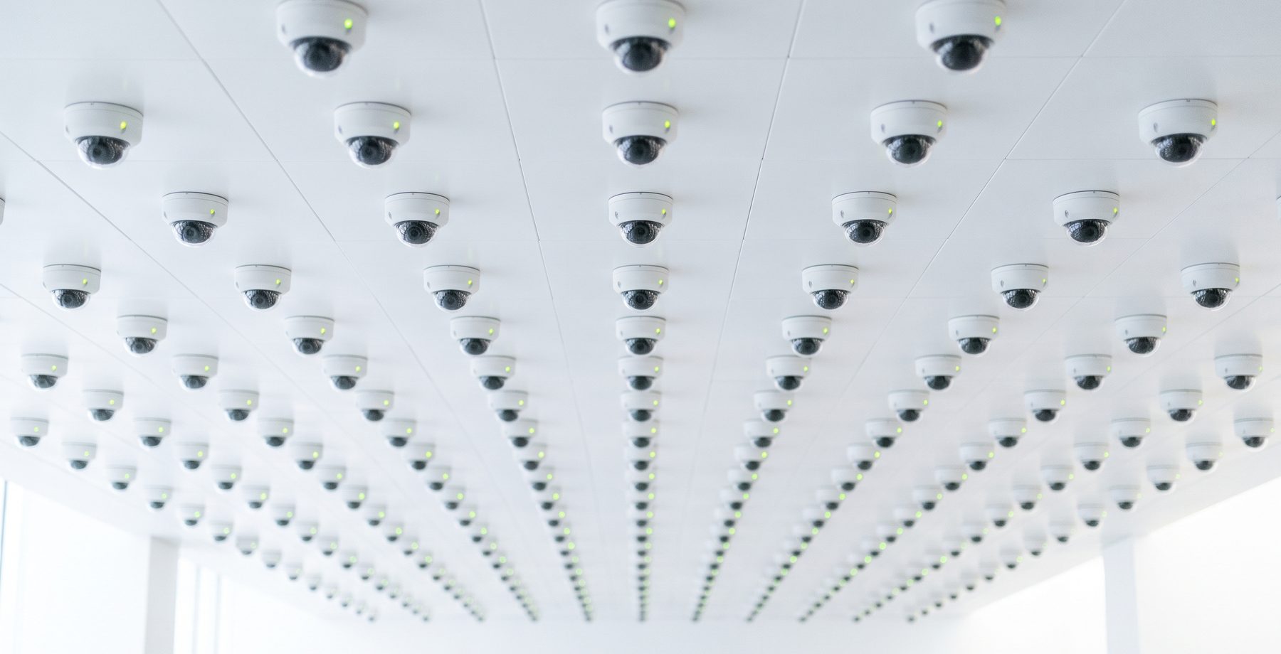 A ceiling array of dome surveillance cameras